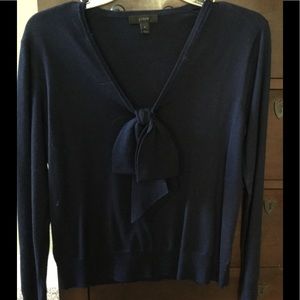 Navy light wool sweater with bow.
